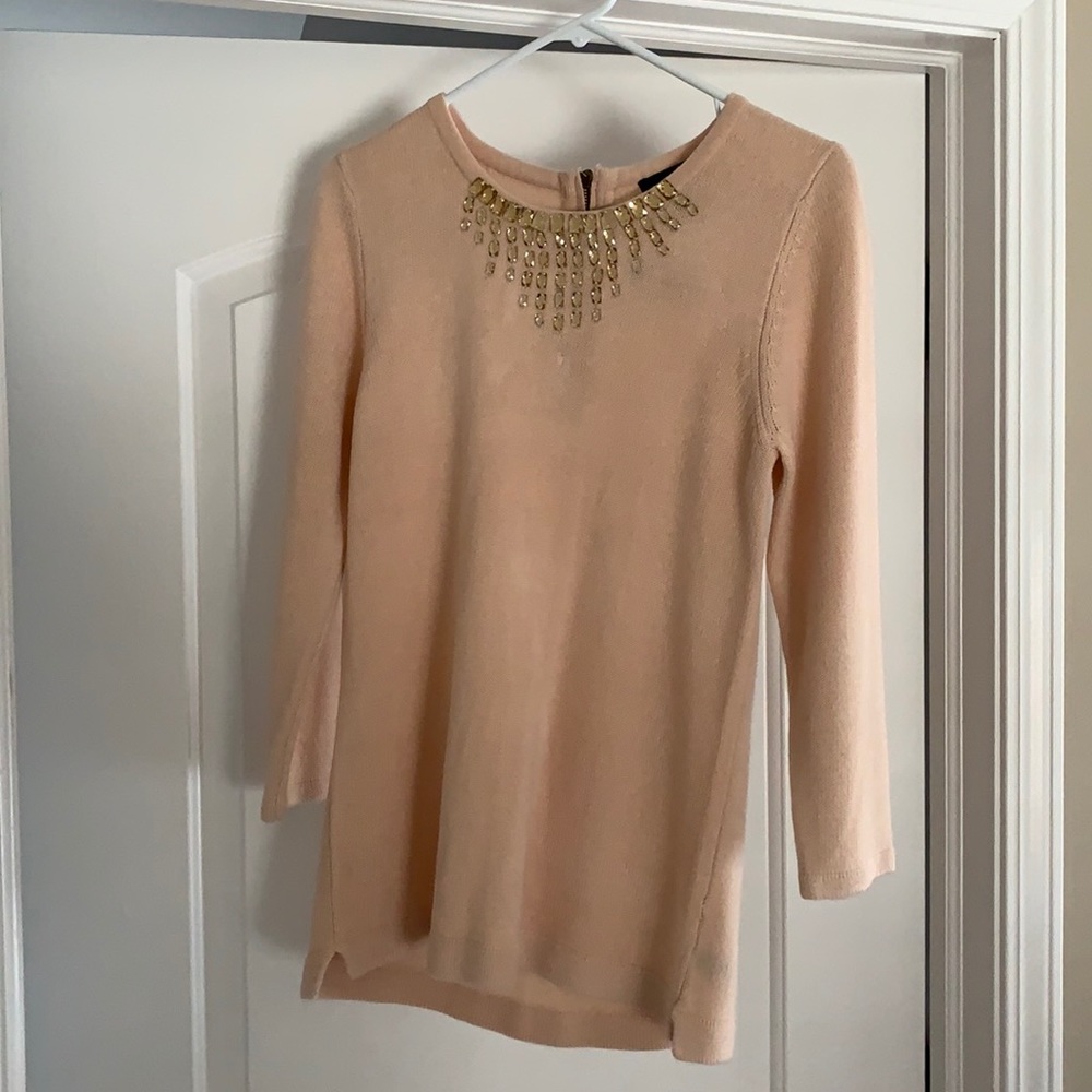 Pink sweater with jewel neckline